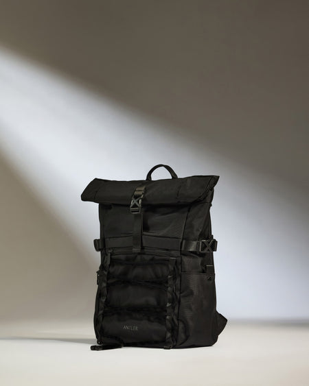 Discovery Roll Top Backpack in Black