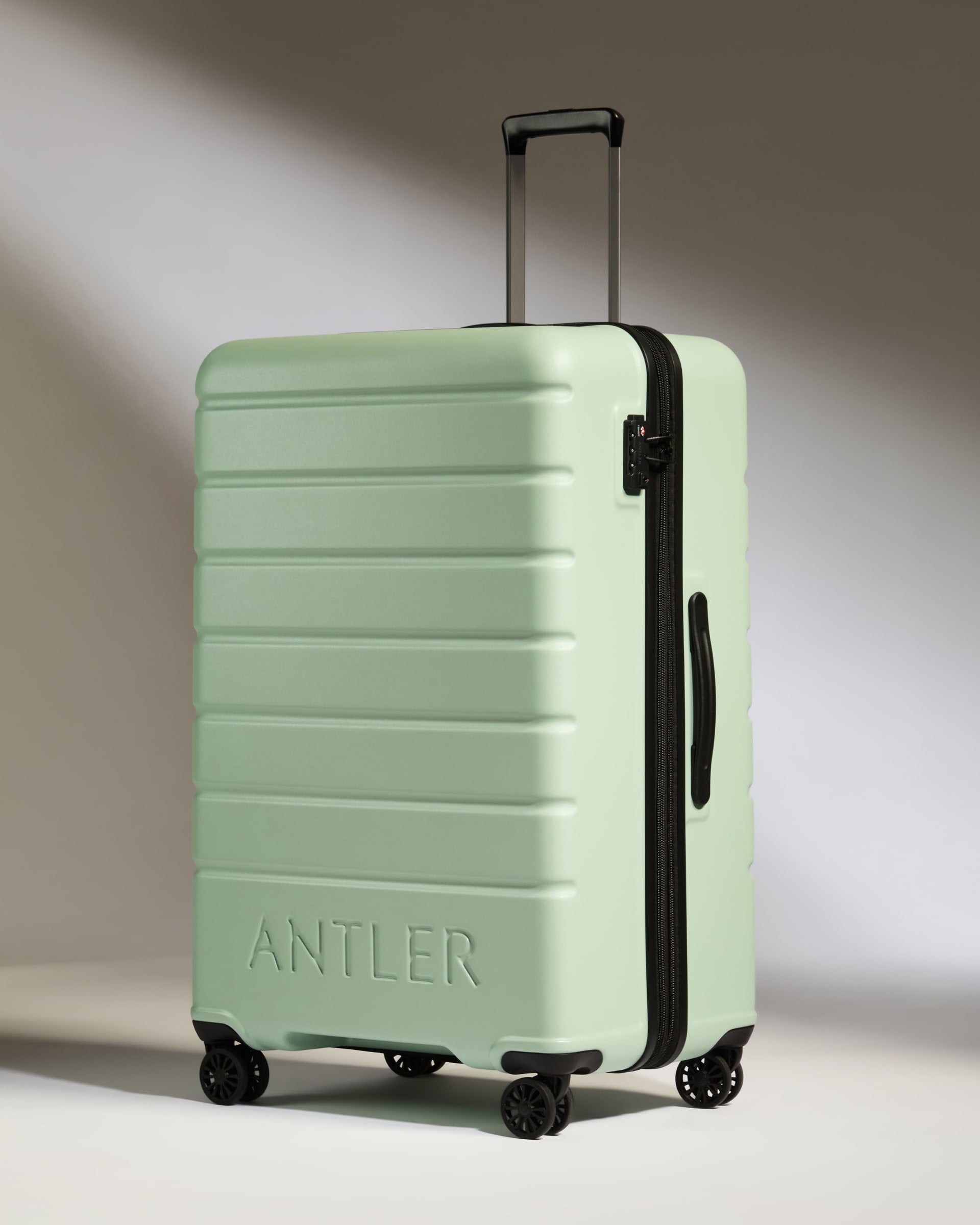 Large Luggage in Aspen Green Logo