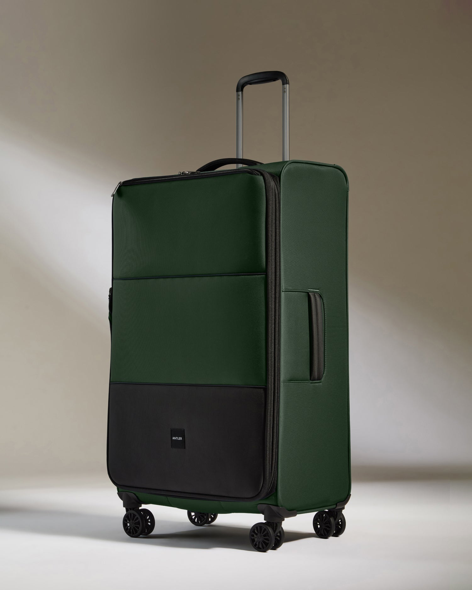 Lightest Large Luggage in Antler Green - Soft Stripe