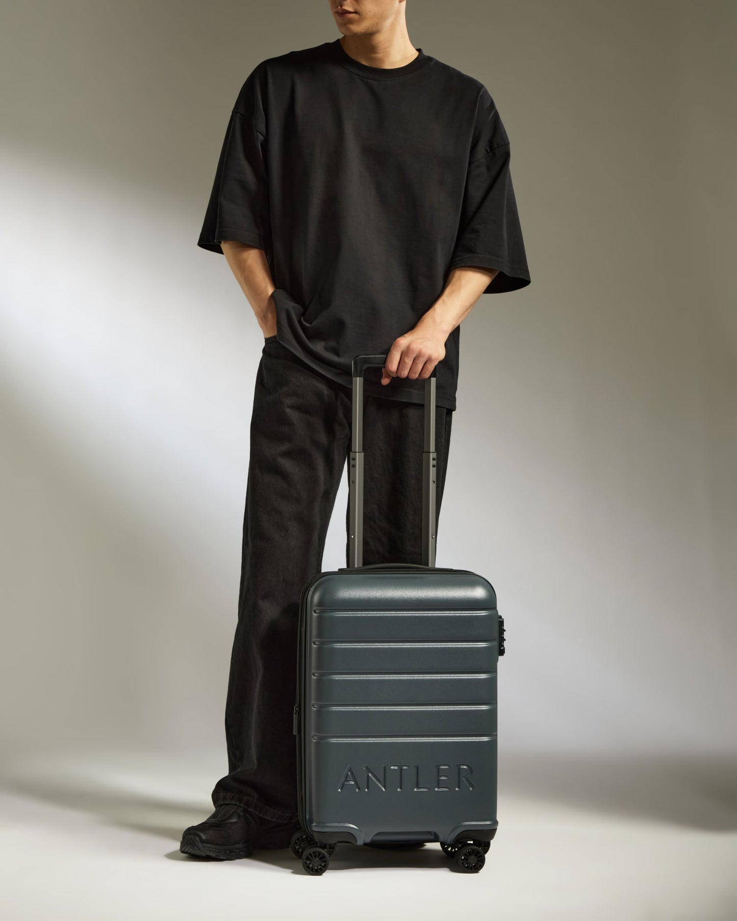 Expandable Carry-on Luggage in Granite Gray - Logo