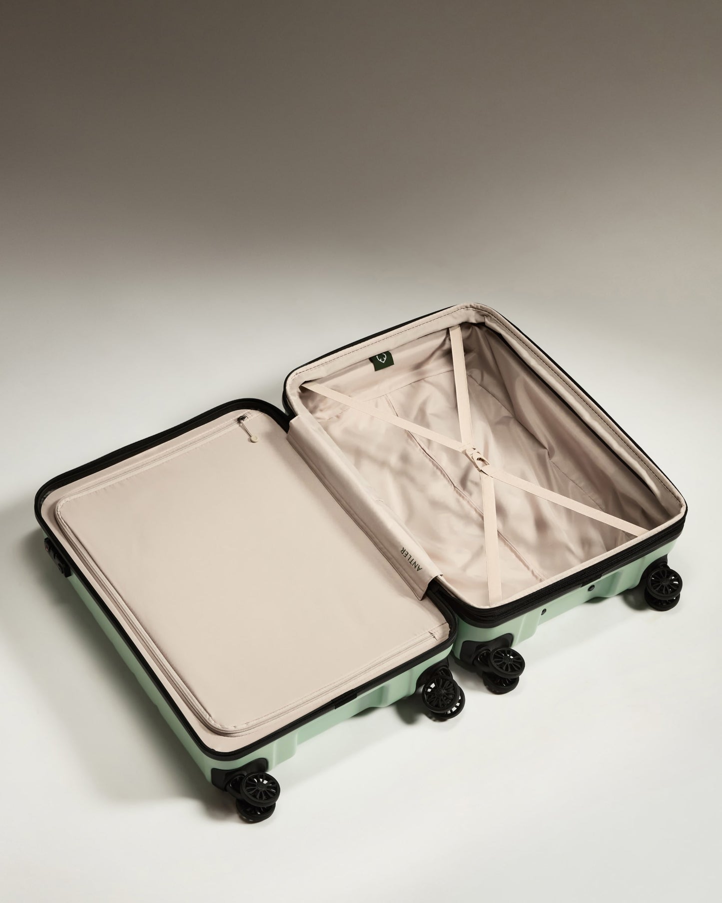 Medium Luggage in Aspen Green - Logo