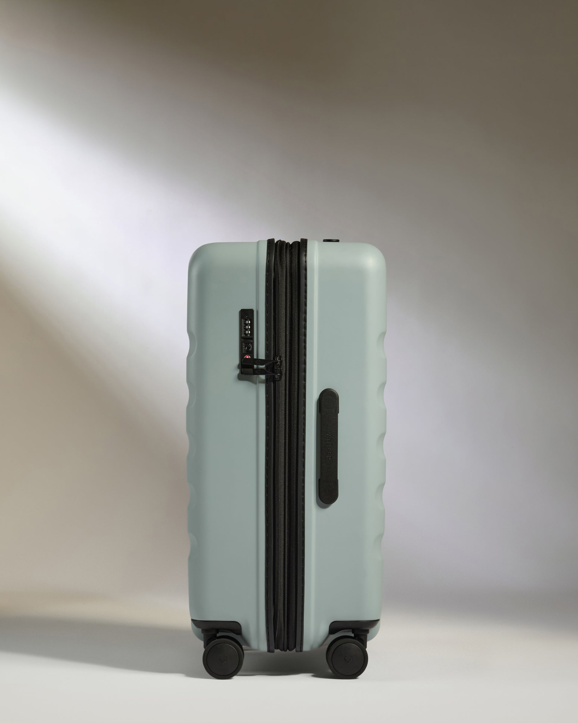 Medium Suitcase in Blue - Icon Stripe | Lightweight & Hard Shell ...