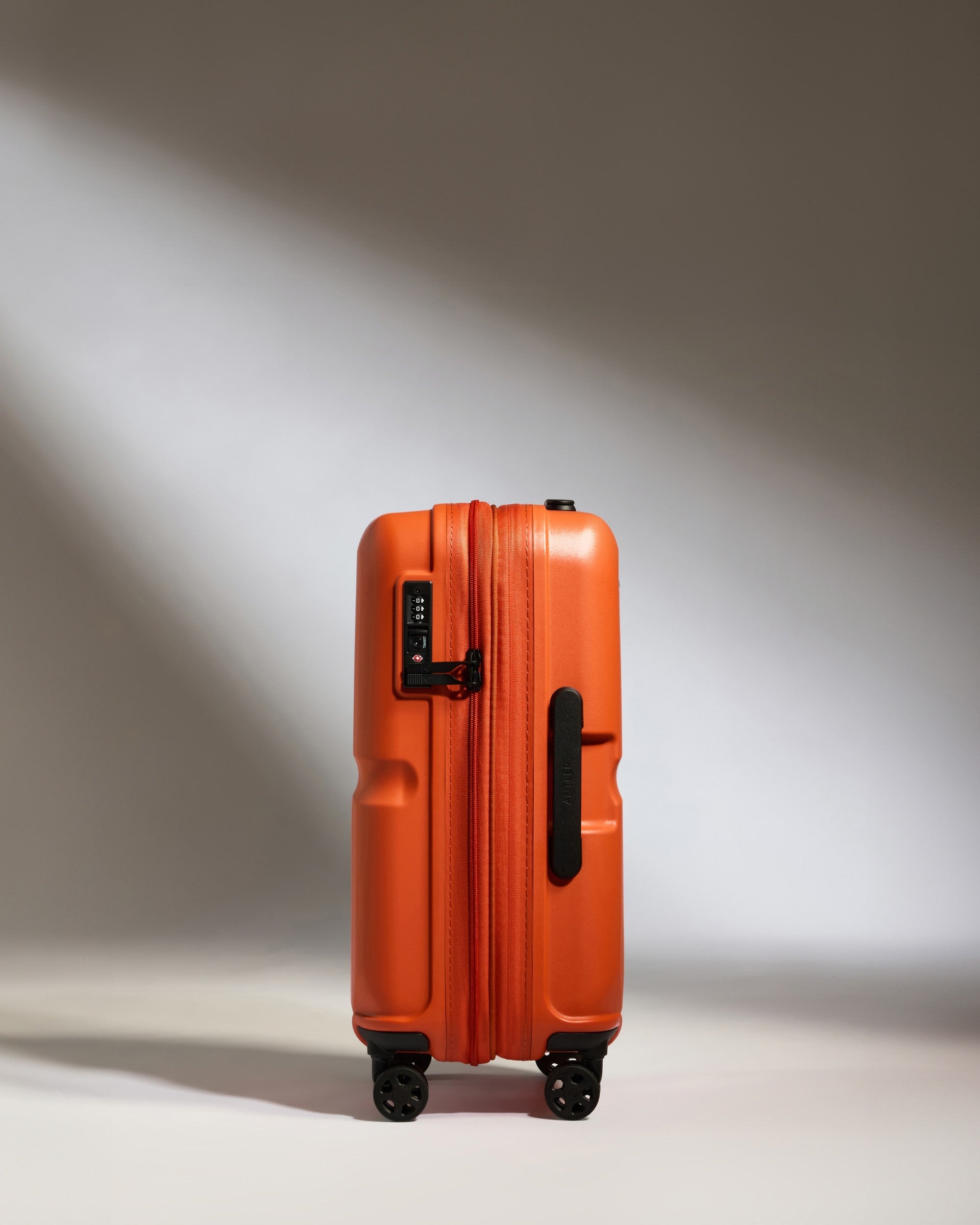 Expandable Carry on Suitcase in Orange Single Stripe Carry on Bag Luggage Antler USA