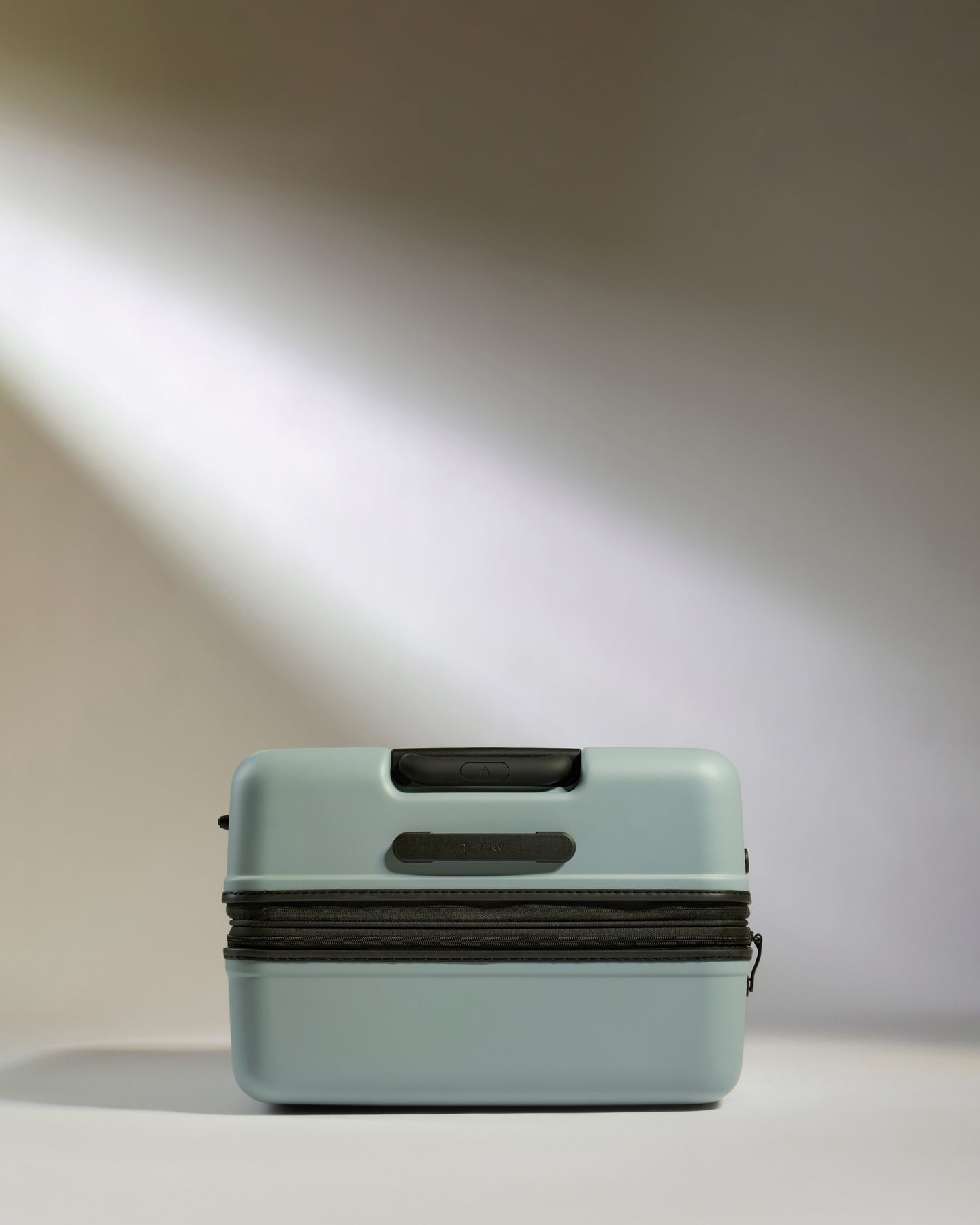 Large Suitcase in Mist Blue - Icon Stripe