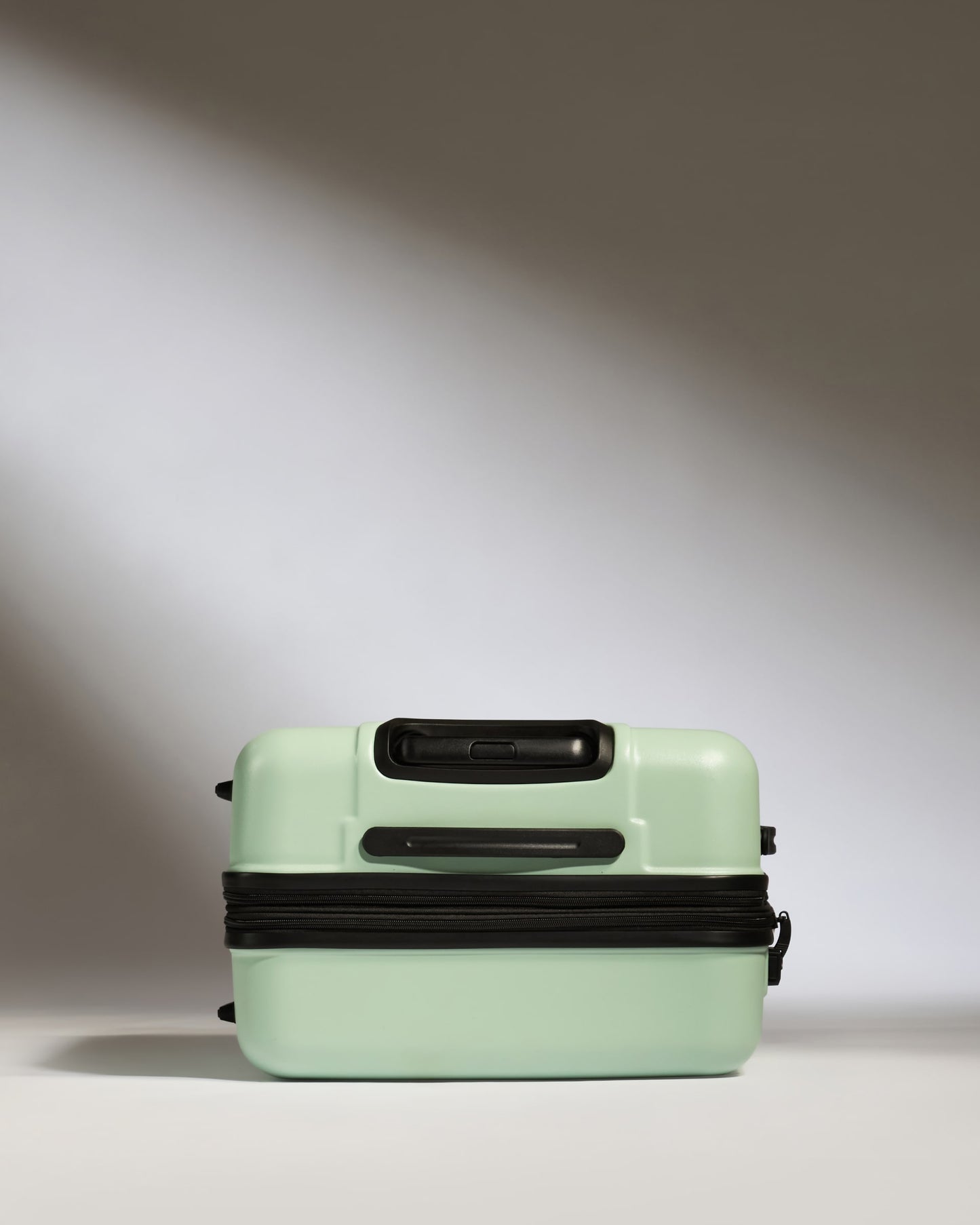 Medium Luggage in Aspen Green - Logo