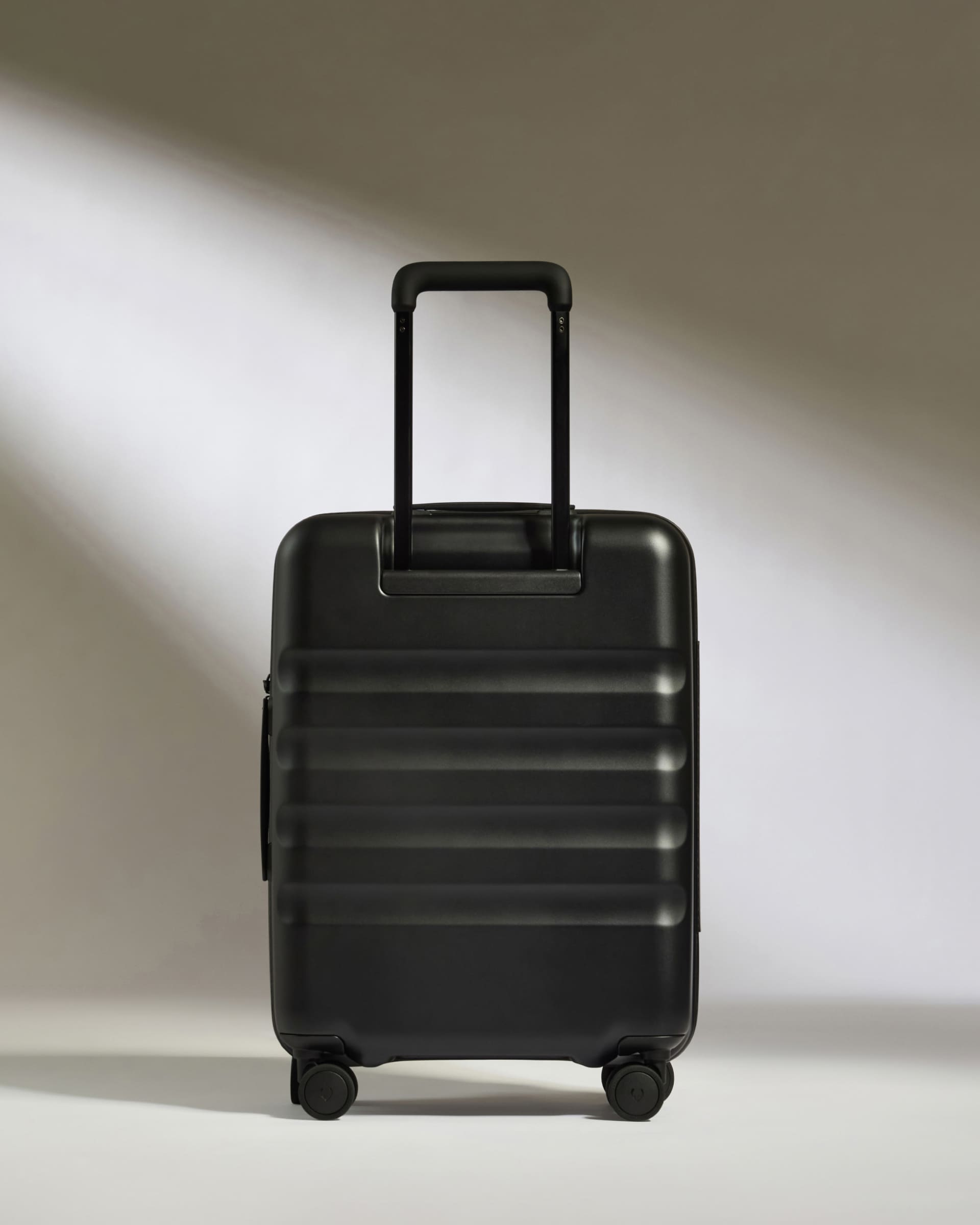 Carry on with Pocket Luggage in Black Icon Stripe Hard Suitcase Antler USA