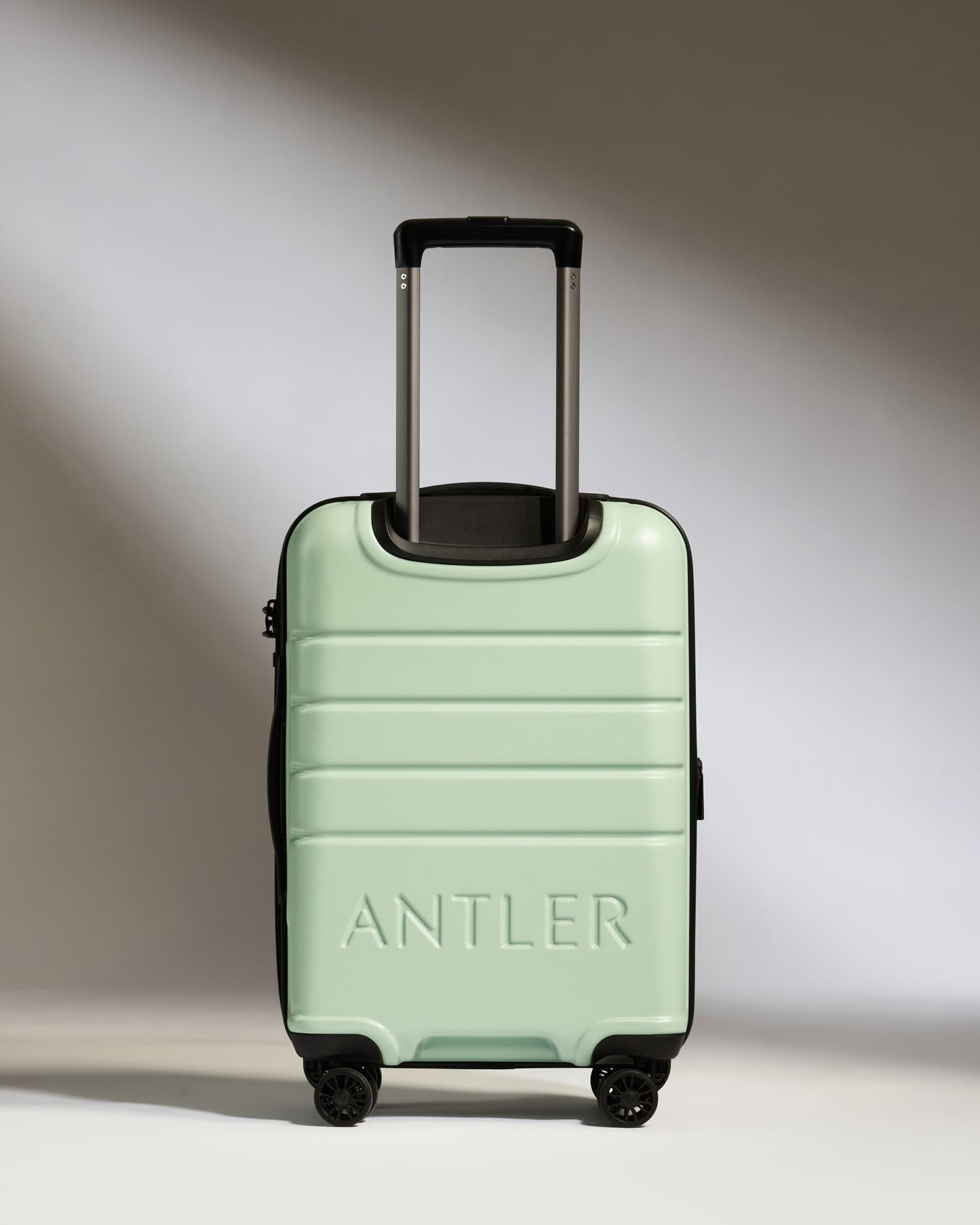 Expandable Carry-on Luggage in Aspen Green - Logo