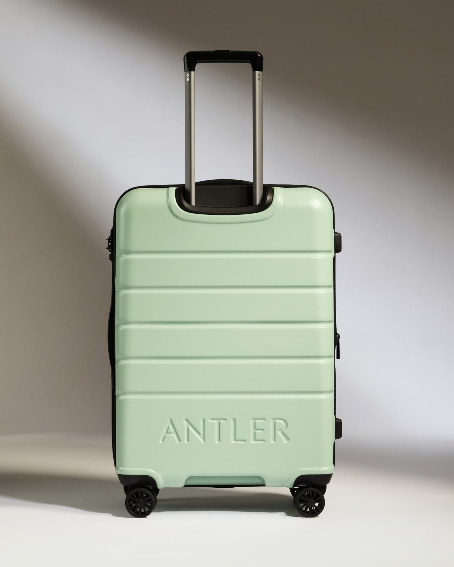 Medium Luggage in Aspen Green - Logo