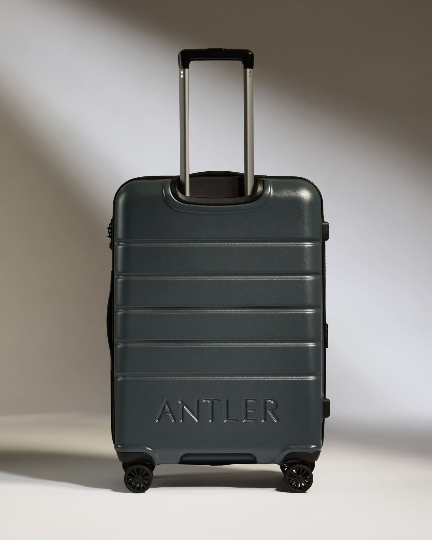 Medium Luggage in Granite Gray - Logo